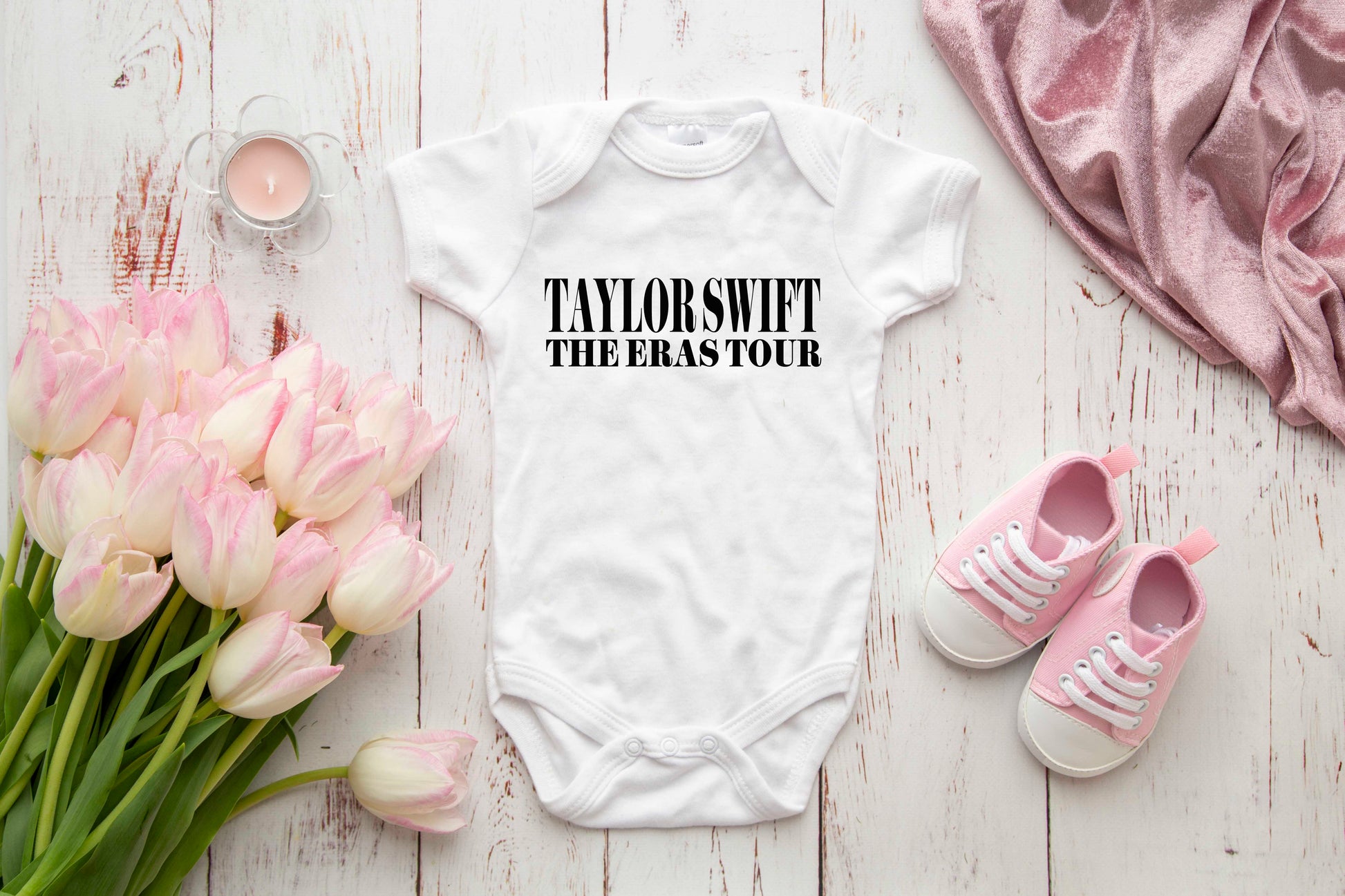 Taylor Swift The Eras Tour baby onesie, black text design