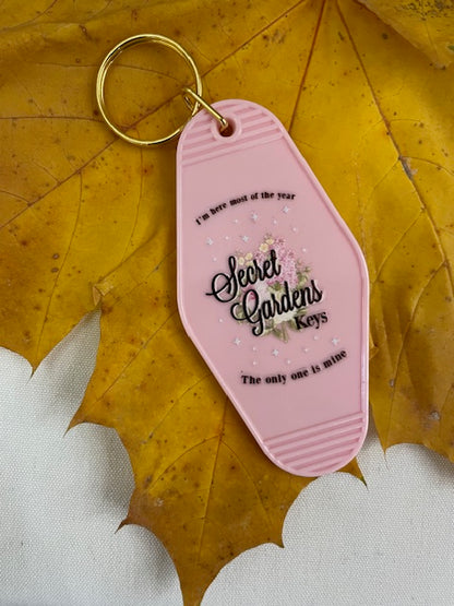 “Secret Gardens” Keychain – I Hate It Here Inspired Motel Tag